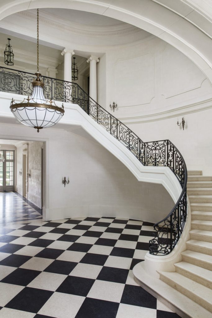 William Hefner two-story luxury foyer chandelier