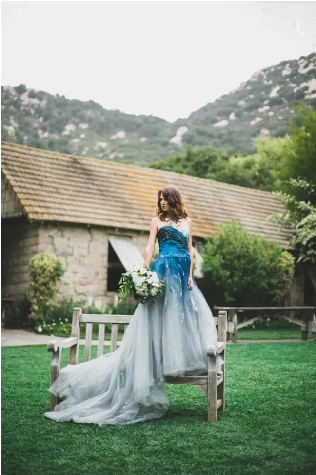 Strapless wedding dress with blue ombre corset