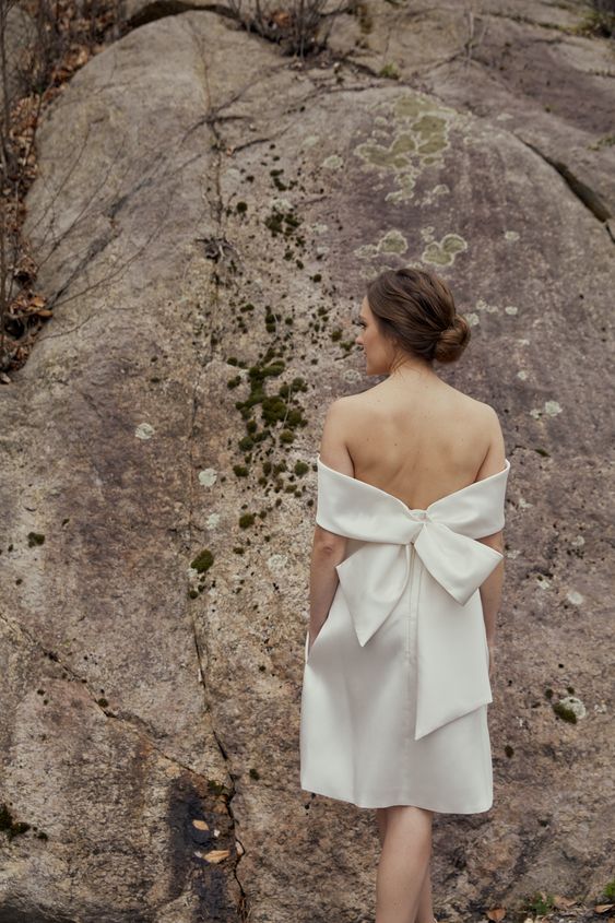 Amsale tea-length wedding dress with a bow