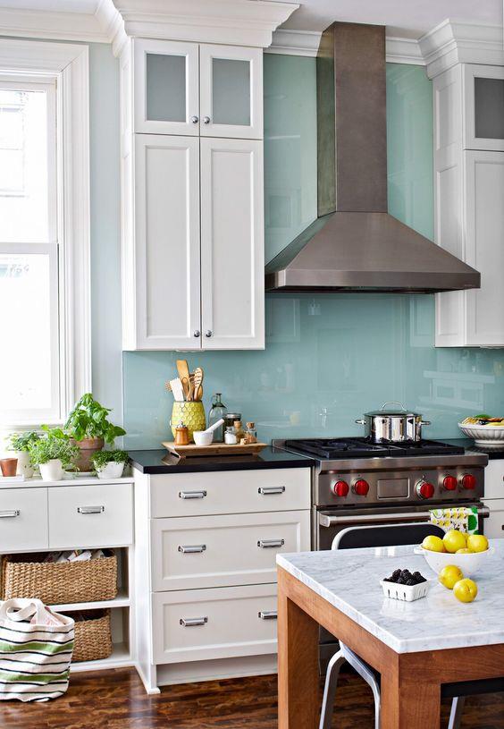 Pastel green painted glass kitchen backsplash tile idea