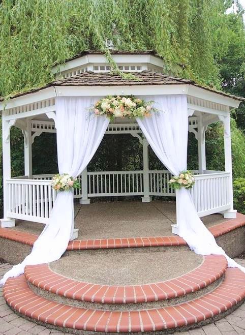 Wedding gazebo with decorated entrance
