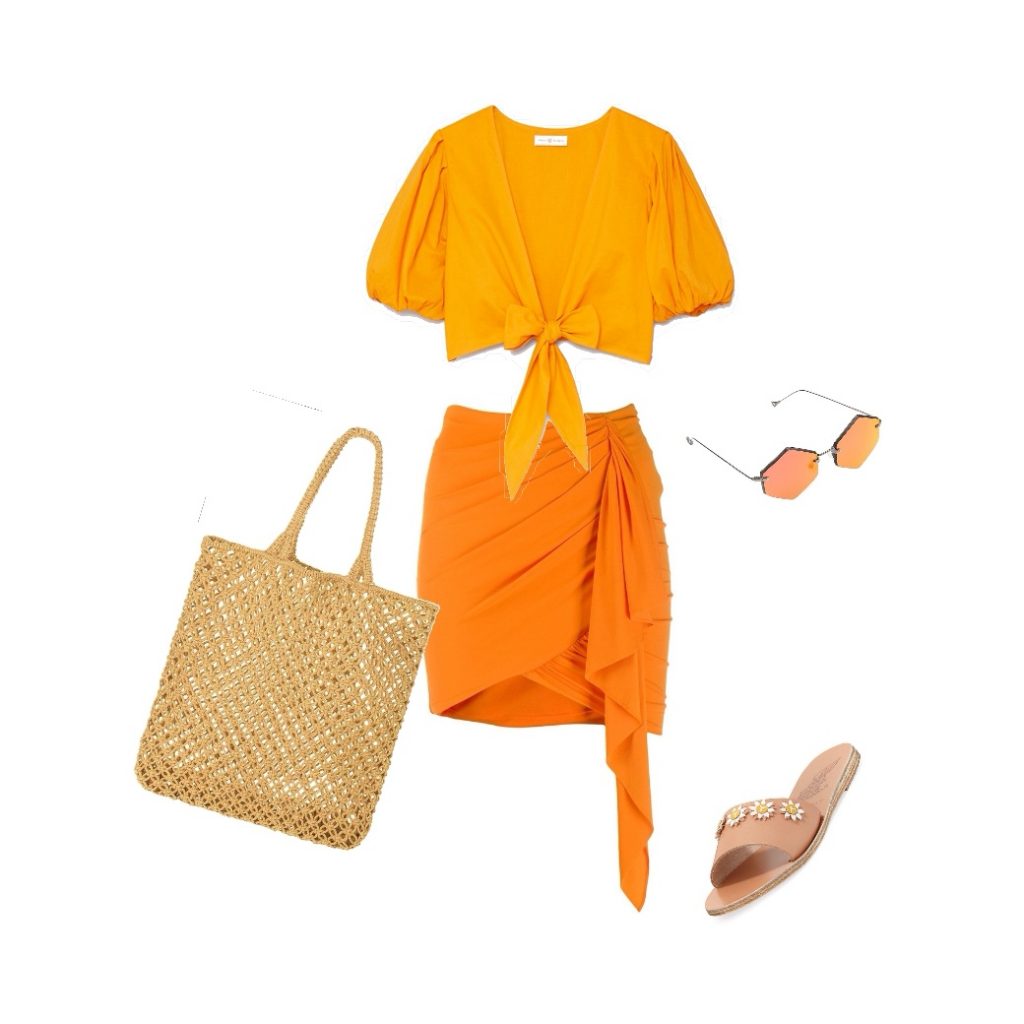 Orange draped skirt with a tie-front crop top