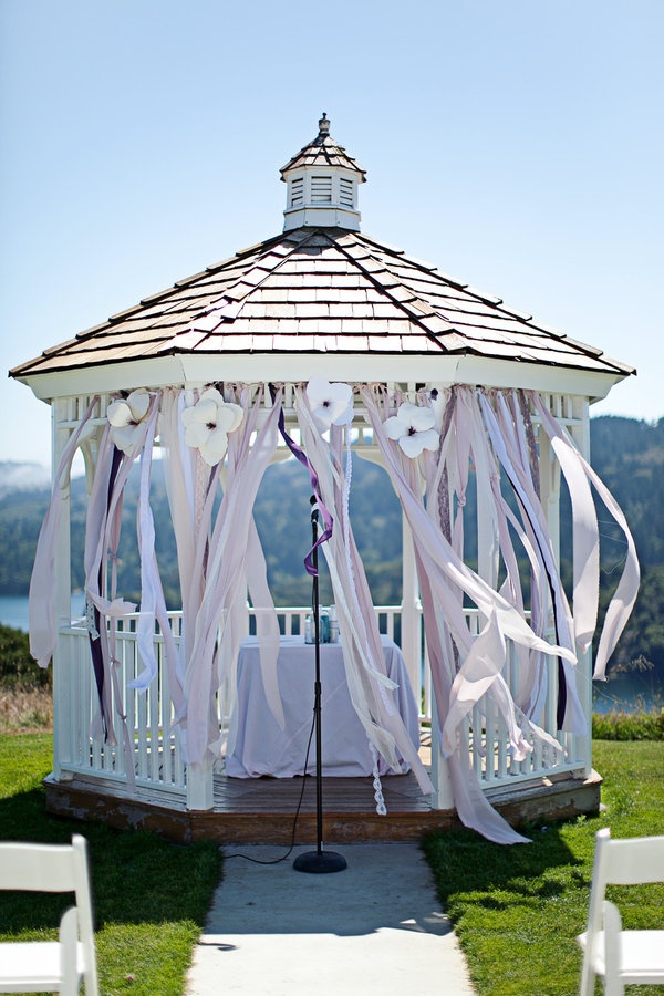 Wedding gazebo decorated with fabric strips