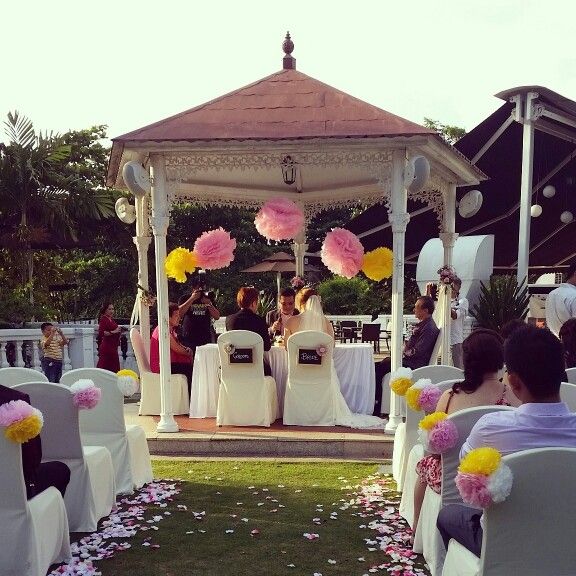 Wedding gazebo decorated with pom poms