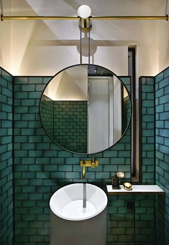 Bathroom design greem subway tiles black grout gold details