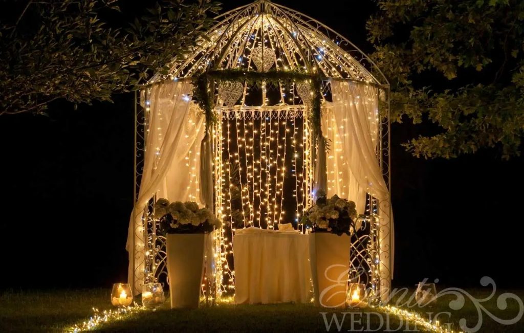 Wedding gazebo decorated with cascading lights