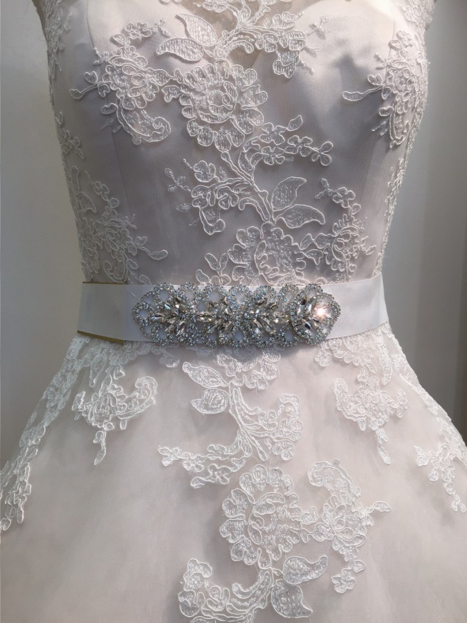 Wedding dress with a belt for pear-shaped body