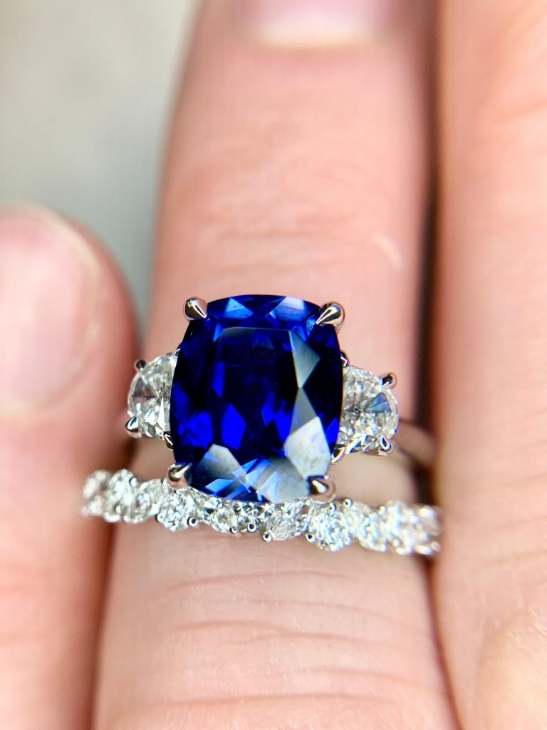 Blue diamond ring to accessorize a navy-blue dress