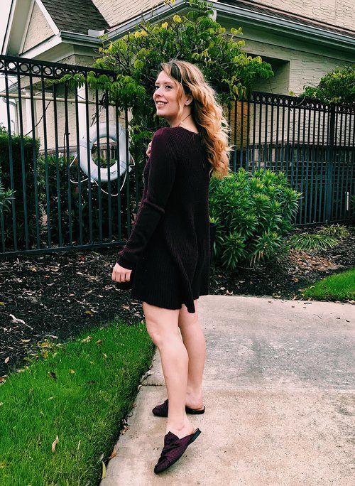 Black sweater dress with black mules outfit idea