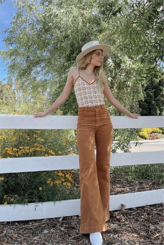 Flared brown corduroy pants and floral top outfit idea for summer