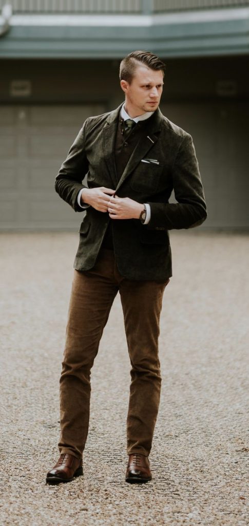 Olive-green blazer shirt tie corduroy pants formal outfit idea for men