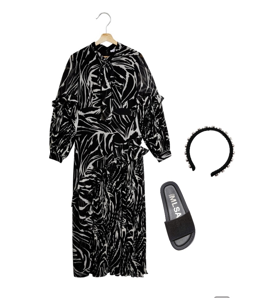 Flowy zebra-pattern dress flip flops outfit to wear after a spray tan