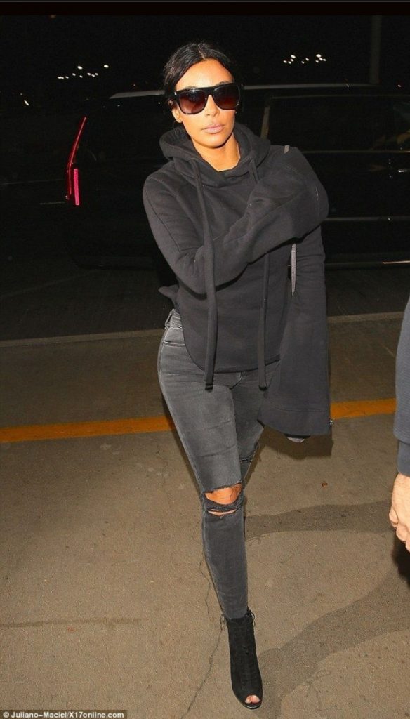Kim Kardashian black ripped jeans hoodie open-toe boots baddie winter outfit idea