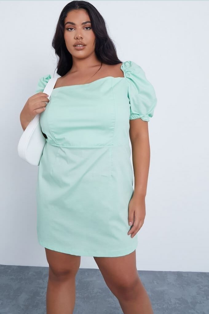 Mint color dress with structured puff sleeves for plus-size apple body shape