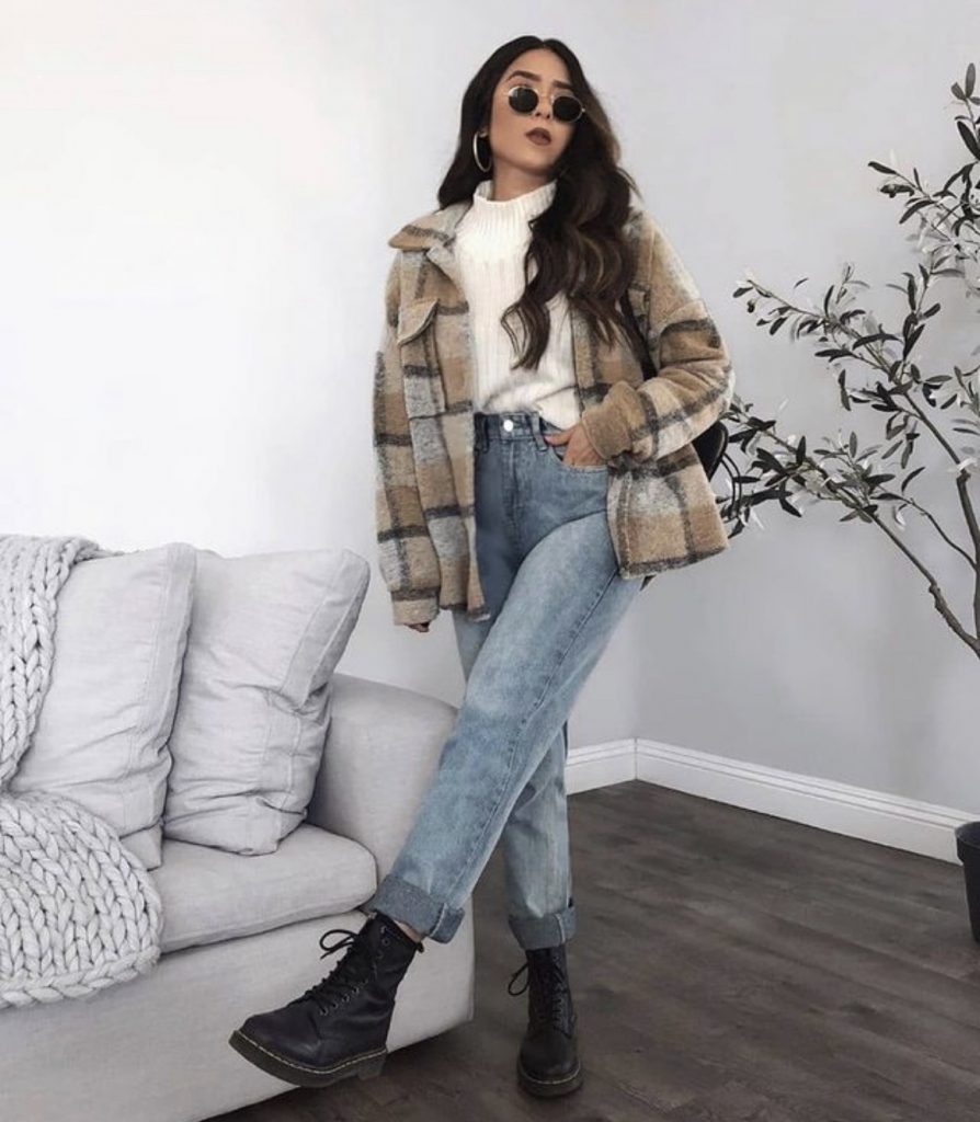 Black combat boots mom jeans jacket winter outfit idea