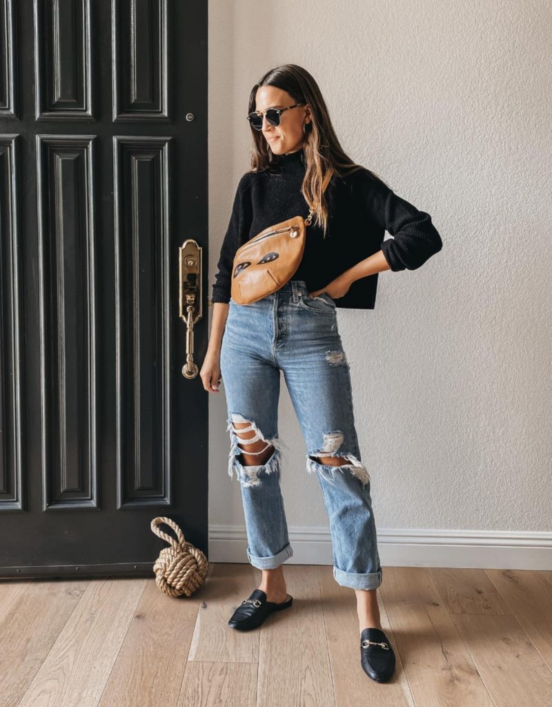 Black mules black turtleneck sweater distressed mom jeans spring outfit idea