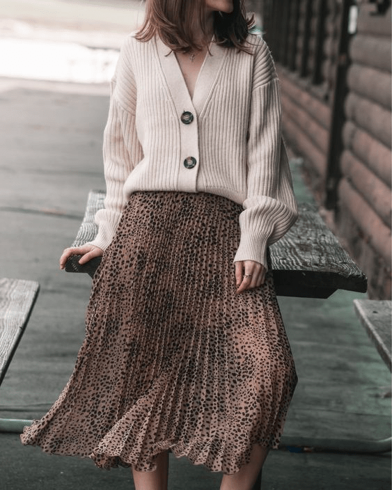 Midi pleated animal print skirt beige cardigan outfit to wear to spa in fall & winter