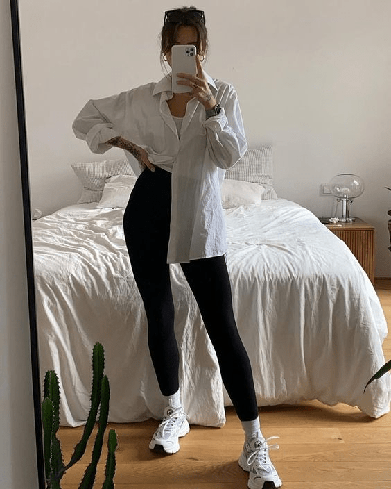 White linen shirt black leggings white top to wear to a massage spa