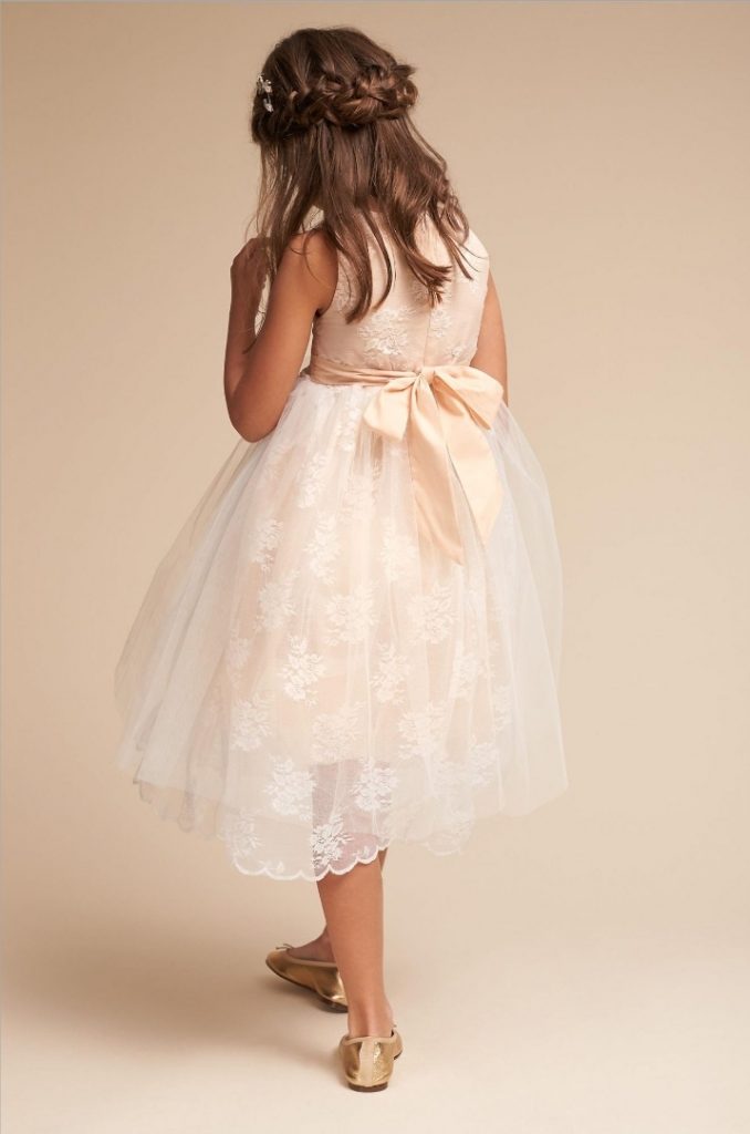 BHLDN flowergirl dress with a bow on the back